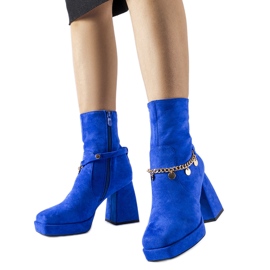 Blue insulated ankle boots with a Saviore pendant