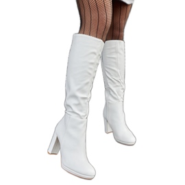 White high-heeled boots by Strother White high-heeled boots by Strother