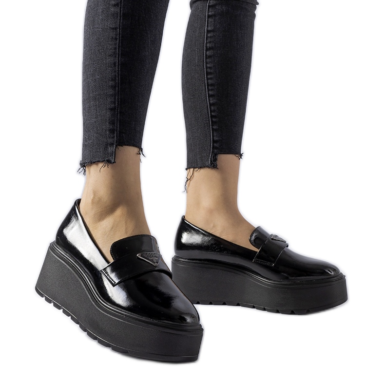 Black patent loafers with a Monra platform