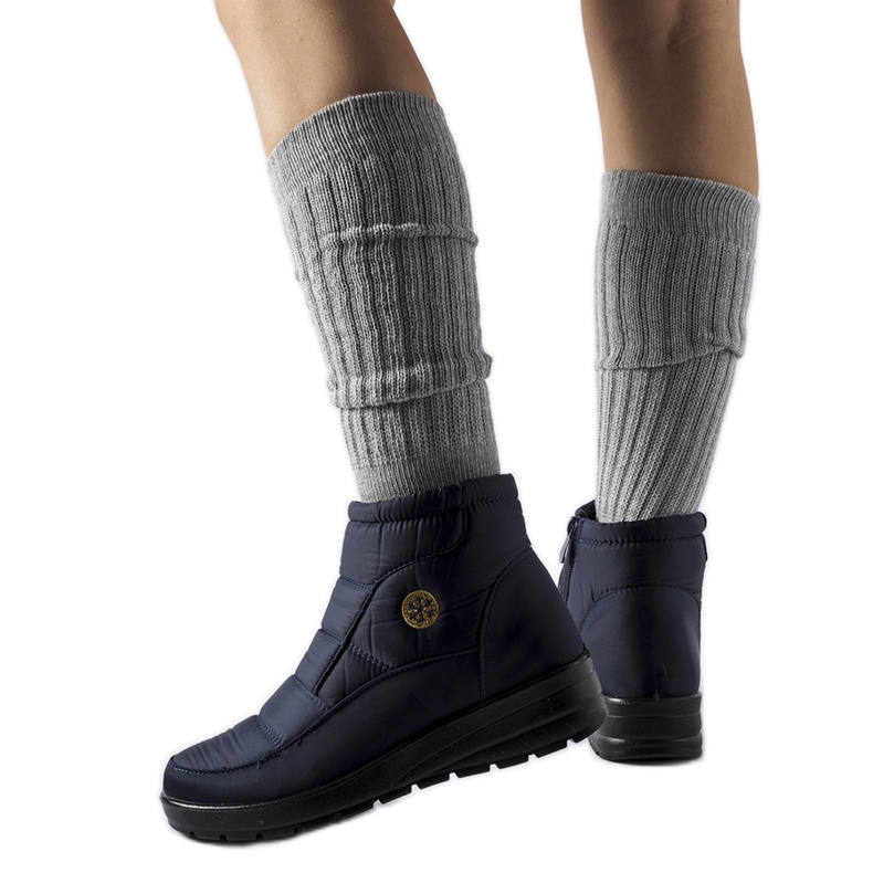 News Navy blue snow boots with a low wedge