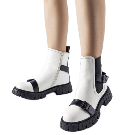 White ankle boots with a massive Fontarine sole