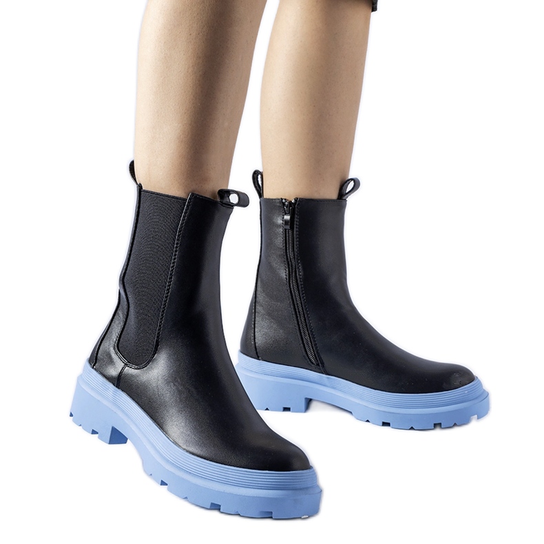 Georgette's black shoes with a blue sole Georgette's black shoes with a blue sole