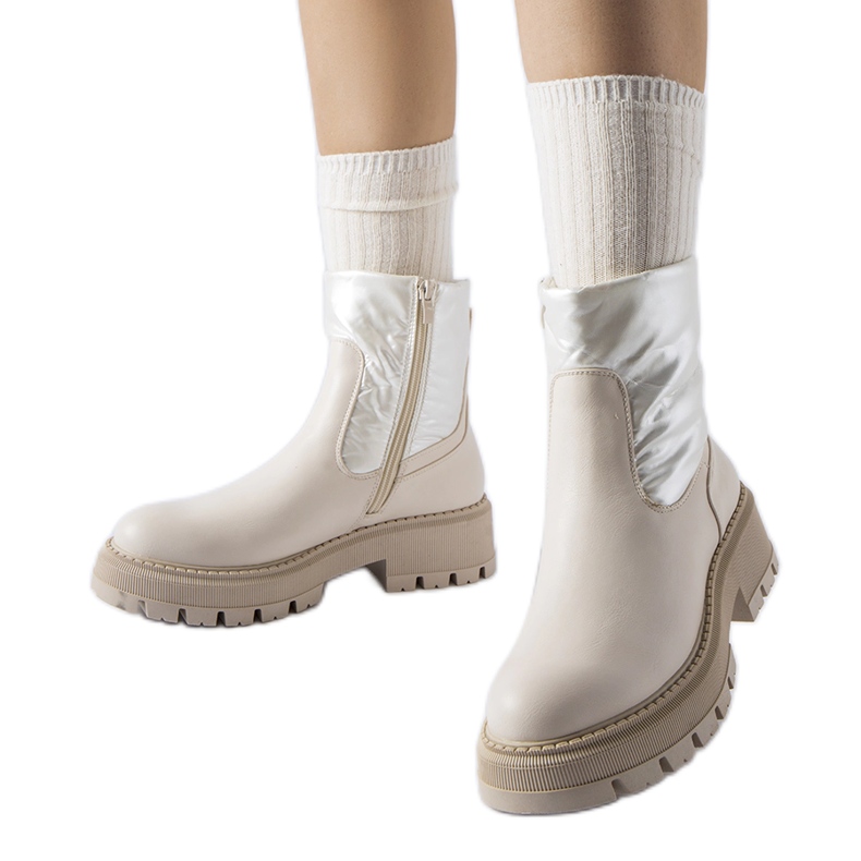 Beige ankle boots with a decorative upper by Garrett