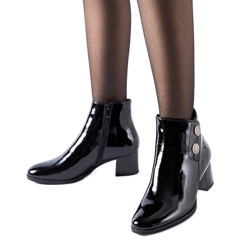 Black patent ankle boots with a low heel by Guido
