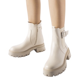 Beige insulated ankle boots with a Casola buckle Beige insulated ankle boots with a Casola buckle