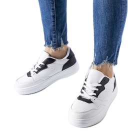 White sneakers with black Fournie accents
