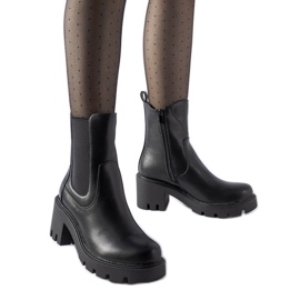Black insulated boots with a Hattiesburg block