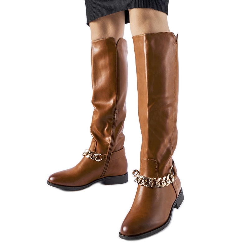 Brown insulated boots with a chain from Millies