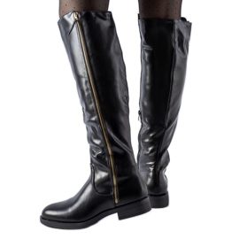 Long black boots with a decorative zipper Nadwa