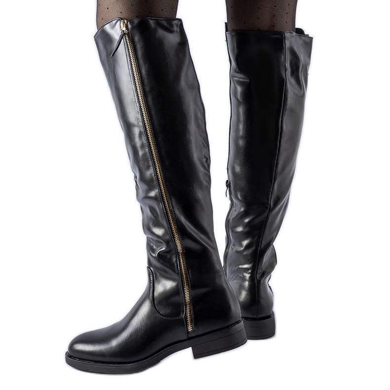 Long black boots with a decorative zipper Nadwa