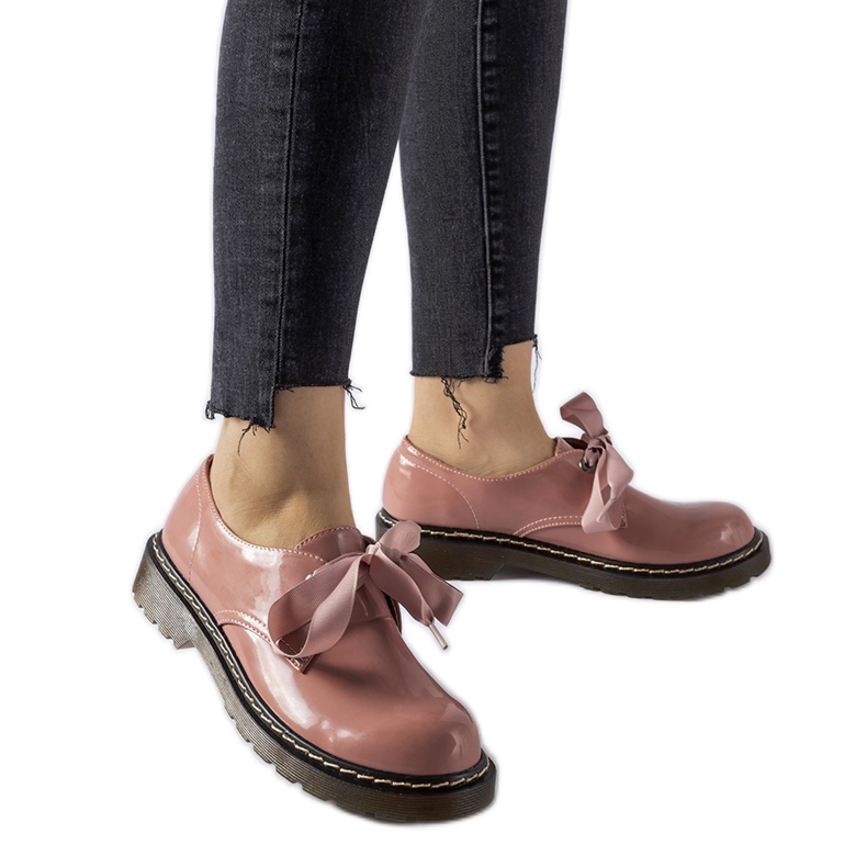 Pink shoes with a decorative bow from Rodriguez