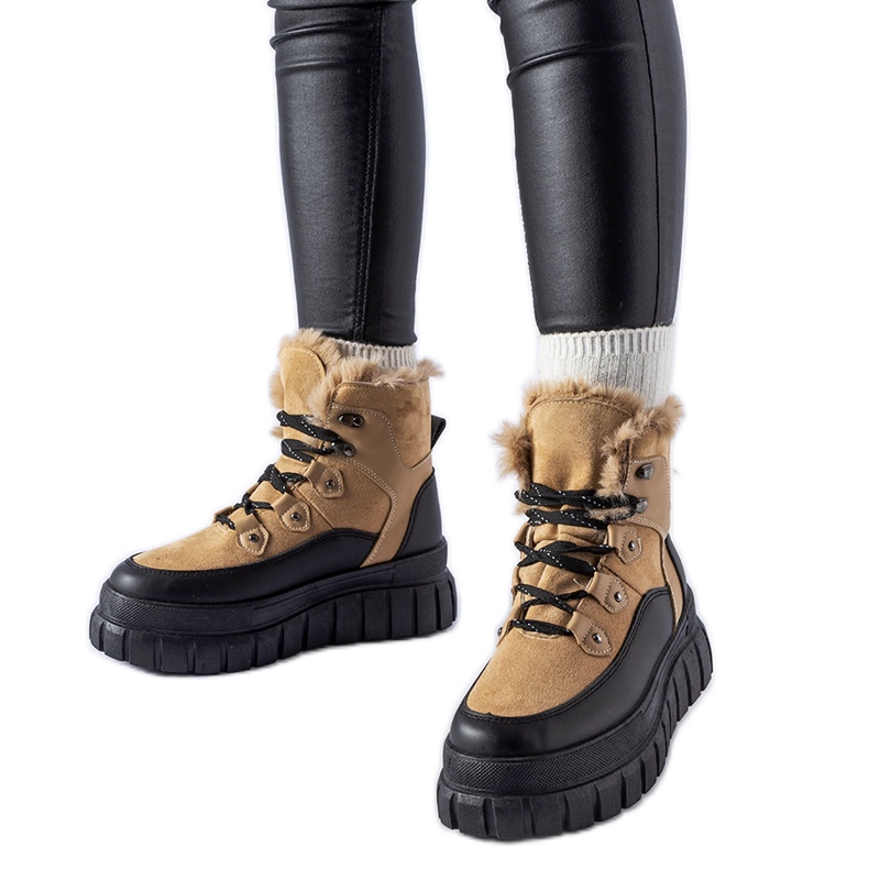 Beige ankle boots with a massive Cervantes sole