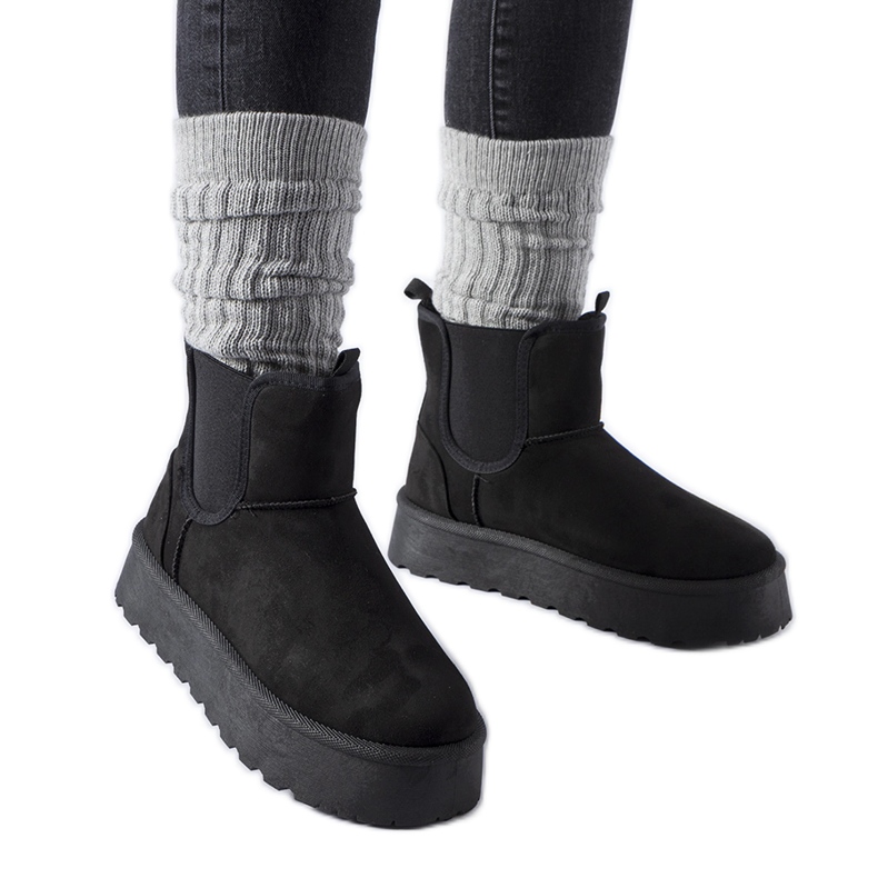 Black snow boots with elastic bands on the sides by Bertino