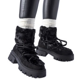 Black ankle boots with decorative fur from Frediano