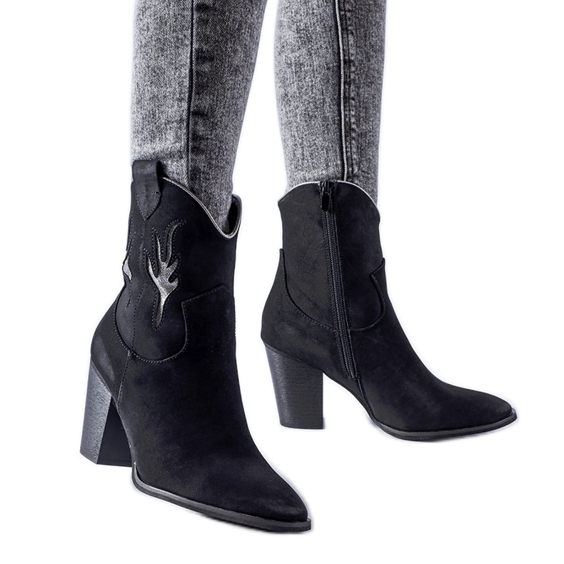 Black cowboy boots with silver Bacoli accessories