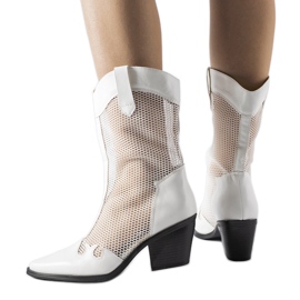 White openwork cowboy boots with a low heel from Beato White openwork cowboy boots with a low heel from Beato