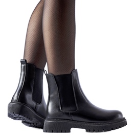Black insulated classic slip-on ankle boots by Noas