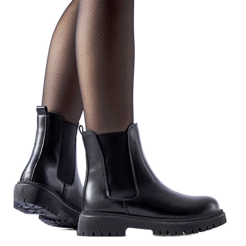 Black insulated classic slip-on ankle boots by Noas