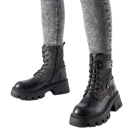 Black insulated boots with Norwalk protector