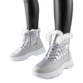 Silver insulated snow boots on the Dwayn platform