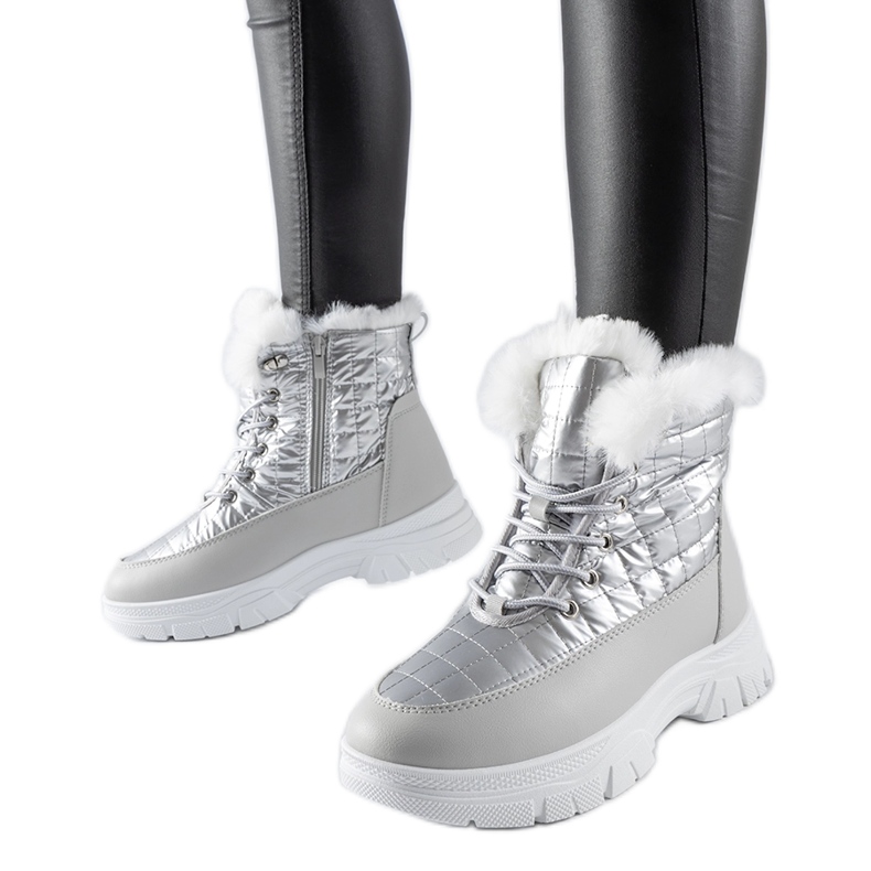 Silver insulated snow boots on the Dwayn platform