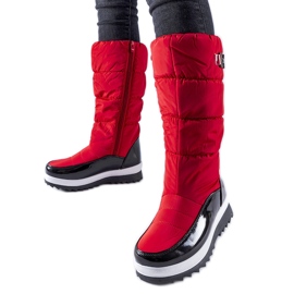 Red insulated high snow boots by Canneto