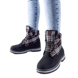 Black boots decorated with a Dino check