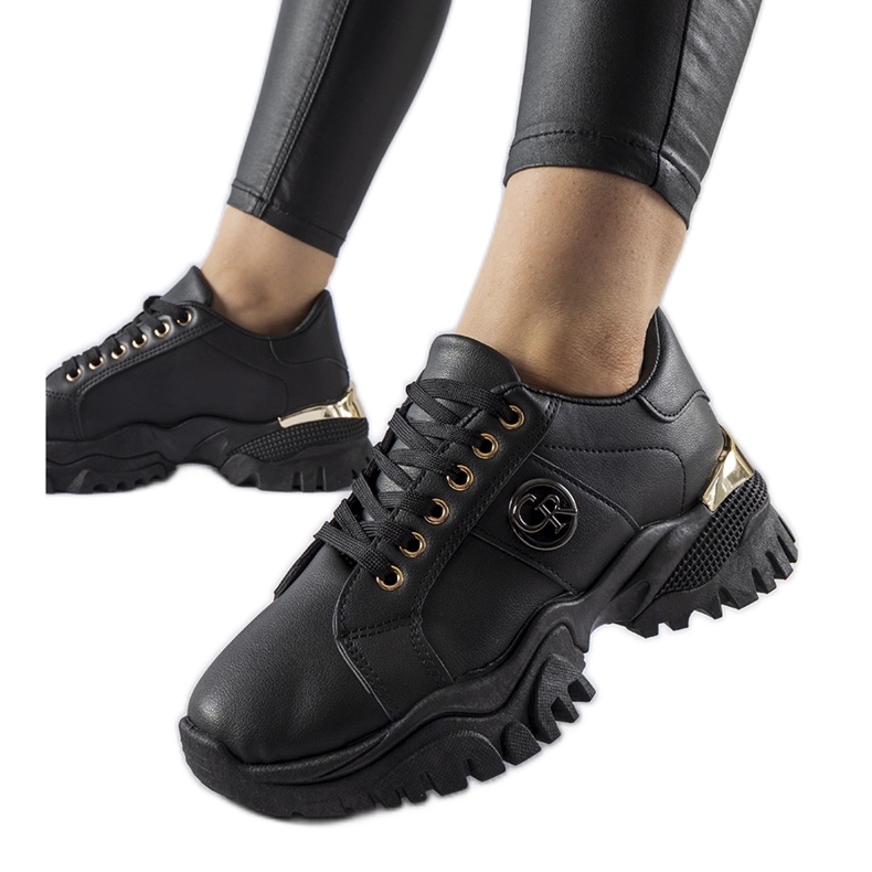 Black sneakers with a massive Arpaia sole