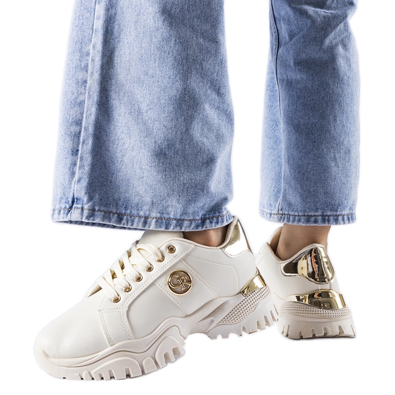 Beige sneakers with a massive Arpaia sole