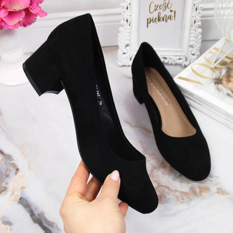 Black suede block pumps by Sergio Leone