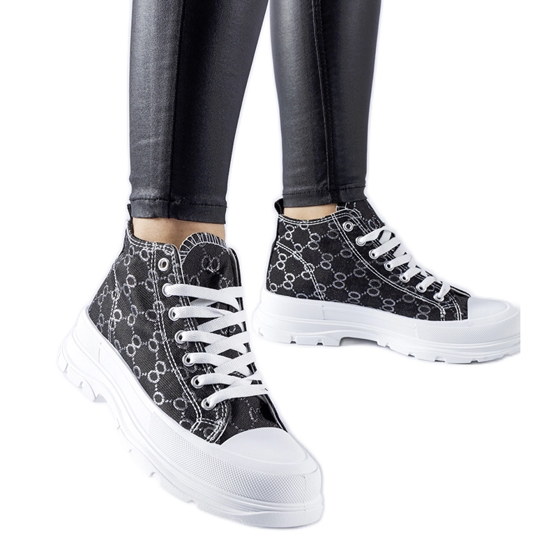 Black sneakers decorated with the Terenzio monogram Black sneakers decorated with the Terenzio monogram