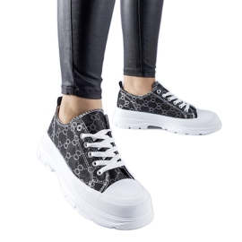 Black sneakers decorated with the Antonella monogram