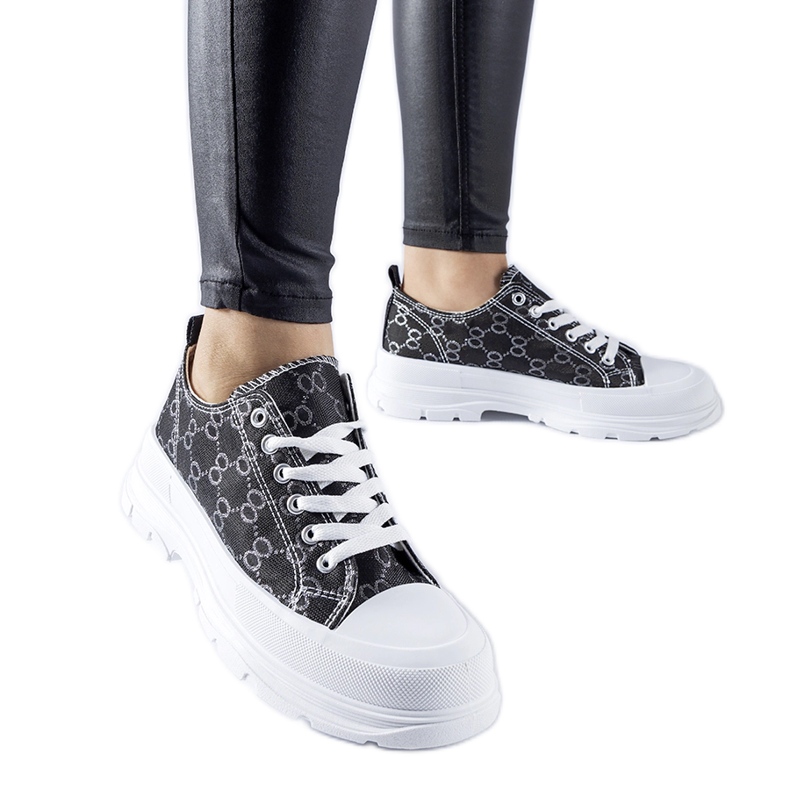 Black sneakers decorated with the Antonella monogram Black sneakers decorated with the Antonella monogram