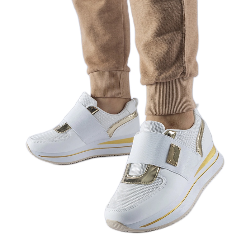 White slip-on sneakers with the Sages platform