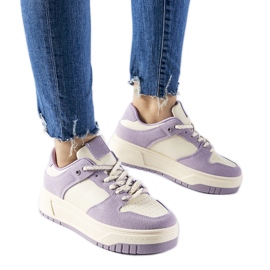 Purple sneakers on the Crim platform