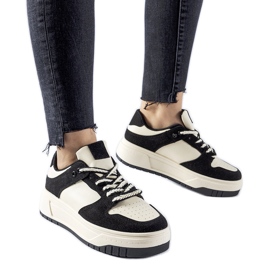 Black sneakers on the Crim platform