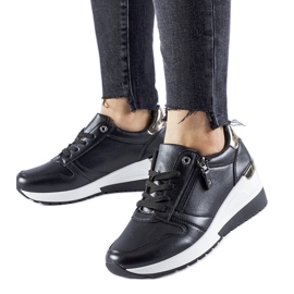 Black sneakers decorated with a Marietta zipper