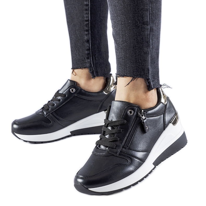 Black sneakers decorated with a Marietta zipper