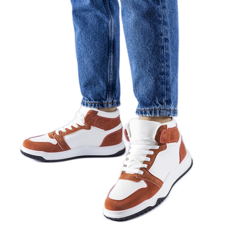 Elizabeth's white and brown high-top sneakers