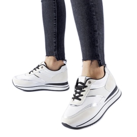 White sneakers on the Nutter platform beige