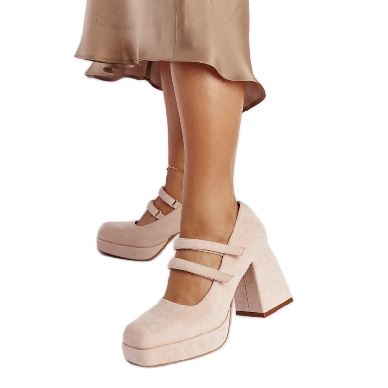 Light pink pumps with a massive block heel Cher