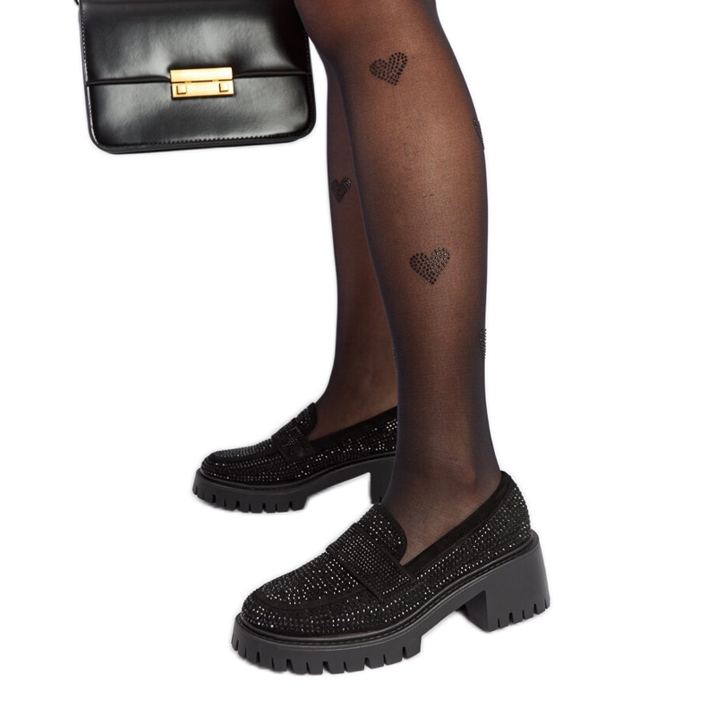 Black moccasins with a massive Parent heel