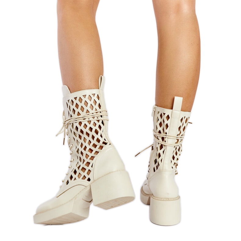 Beige openwork high-heeled boots from Visalia
