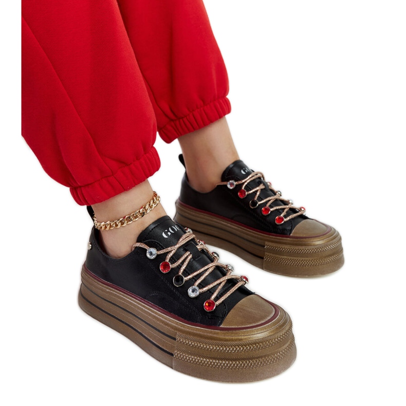 Black sneakers on the GOE NN2N4053 platform