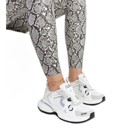 White sneakers with a massive Jacobine sole