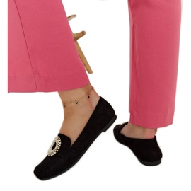 Black moccasins decorated with Celena rhinestones Black moccasins decorated with Celena rhinestones