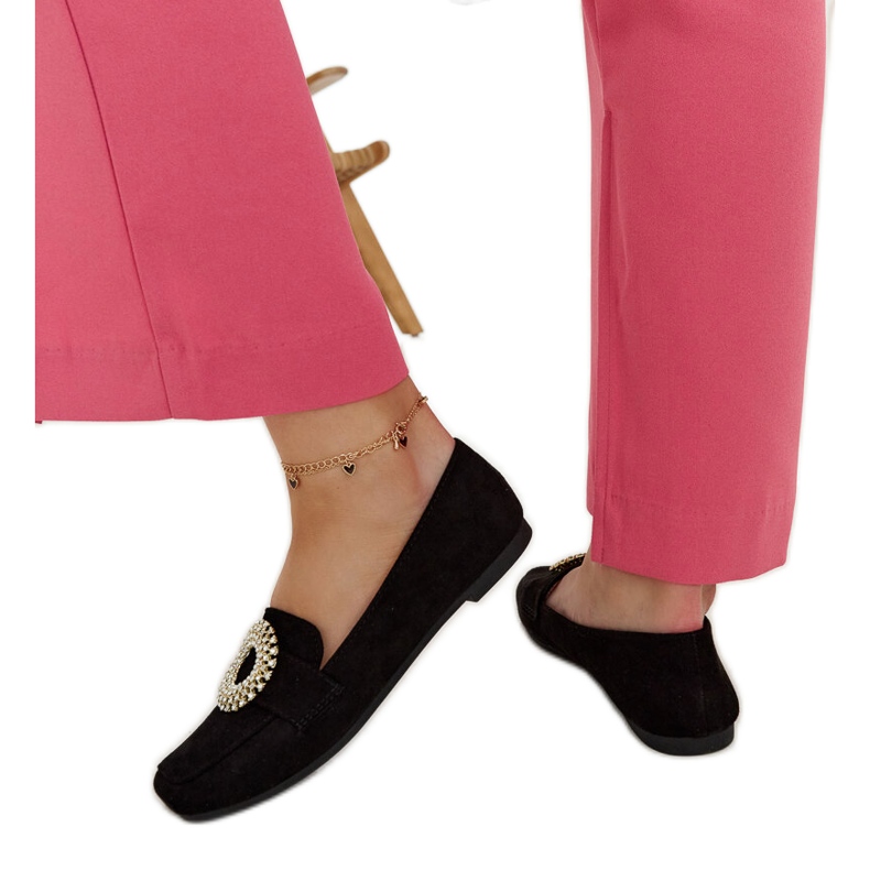 Black moccasins decorated with Celena rhinestones