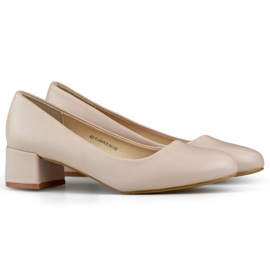 Beige low-heeled pumps with a round toe