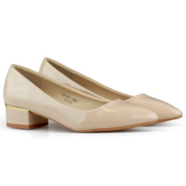 Beige patent leather pumps with a low heel