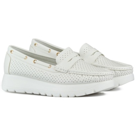 Comfortable openwork white women's moccasins with a leather insole Comfortable openwork white women's moccasins with a leather insole